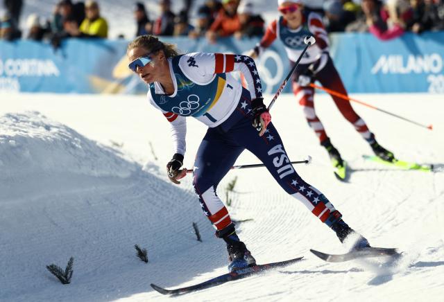 USA's Jessie Diggins competes during the women's cross country 50km mass start final event of the Milano Cortina 2026 Winter Olympic Games at Tesero Cross-Country Skiing Stadium in Lago di Tesero (Val di Fiemme), on February 22, 2026. (Photo by Anne-Christine POUJOULAT / AFP)
