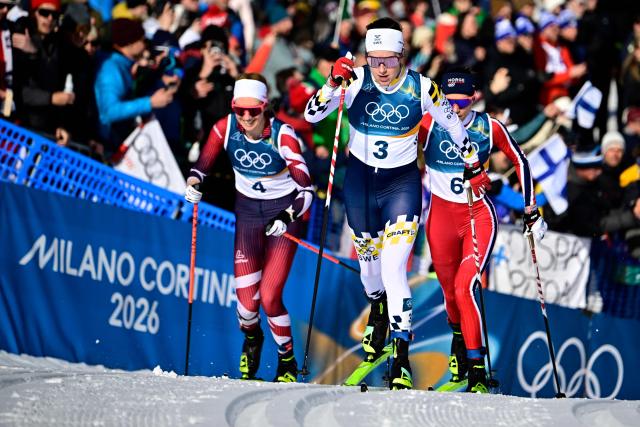 Austria's Teresa Stadlober (L), Sweden's Ebba Andersson and Norway's Heidi Weng compete during the women's cross country 50km mass start final event of the Milano Cortina 2026 Winter Olympic Games at Tesero Cross-Country Skiing Stadium in Lago di Tesero (Val di Fiemme), on February 22, 2026. (Photo by Tobias SCHWARZ / AFP)