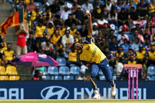 Sri Lanka's Dilshan Madushanka delivers a ball during the 2026 ICC Men's T20 Cricket World Cup Super Eights match between Sri Lanka and England at Pallekele International Cricket Stadium in Kandy on February 22, 2026. (Photo by Ishara S. KODIKARA / AFP)