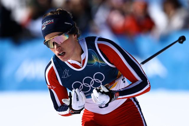 Norway's Kristin Austgulen Fosnaes competes during the women's cross country 50km mass start final event of the Milano Cortina 2026 Winter Olympic Games at Tesero Cross-Country Skiing Stadium in Lago di Tesero (Val di Fiemme), on February 22, 2026. (Photo by Anne-Christine POUJOULAT / AFP)