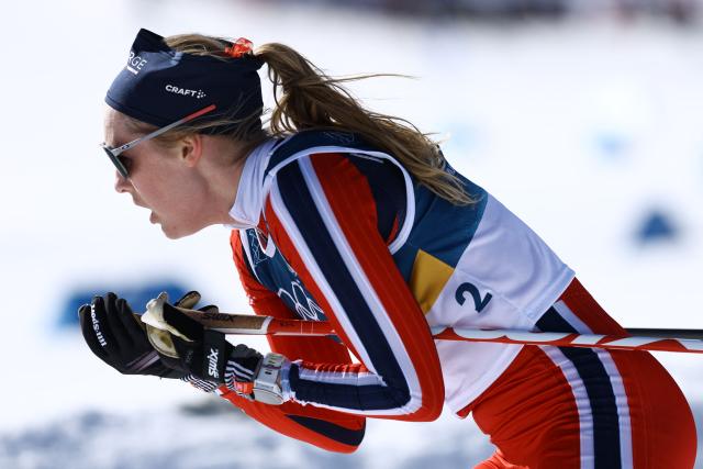 Norway's Karoline Simpson-Larsen competes during the women's cross country 50km mass start final event of the Milano Cortina 2026 Winter Olympic Games at Tesero Cross-Country Skiing Stadium in Lago di Tesero (Val di Fiemme), on February 22, 2026. (Photo by Anne-Christine POUJOULAT / AFP)
