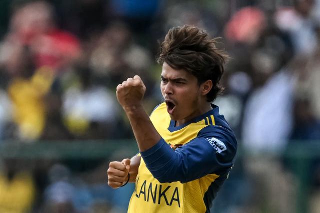 Sri Lanka's Dunith Wellalage celebrates after taking the wicket of England's captain Harry Brook during the 2026 ICC Men's T20 Cricket World Cup Super Eights match between Sri Lanka and England at Pallekele International Cricket Stadium in Kandy on February 22, 2026. (Photo by Dibyangshu SARKAR / AFP)