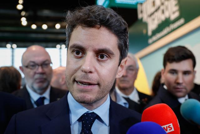 President of Ensemble Pour la Republique parliamentary group Gabriel Attal addresses media  as he visits the International Agricultural Show (Salon de l'Agriculture) at Paris Expo Porte de Versailles in Paris on February 22, 2026. (Photo by Charlotte SIEMON / AFP)