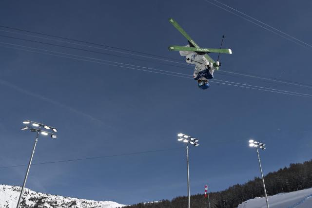 China's Gu Ailing Eileen competes in the freestyle skiing women's freeski halfpipe final run 2 during the Milano Cortina 2026 Winter Olympic Games at Livigno Snow Park, in Livigno (Valtellina), on February 22, 2026. (Photo by Jeff PACHOUD / AFP)