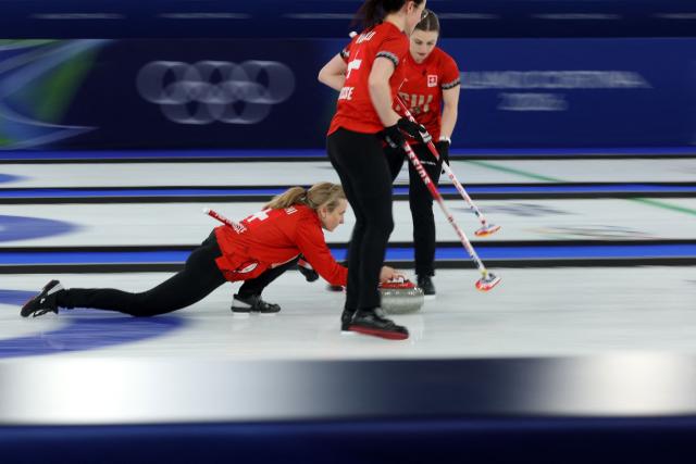 Switzerland's Silvana Tirinzoni delivers the stone in the curling women's round robin gold medal game between Switzerland and Sweden during the Milano Cortina 2026 Winter Olympic Games at the Cortina Curling Olympic Stadium in Cortina d’Ampezzo on February 22, 2026. (Photo by Odd ANDERSEN / AFP)