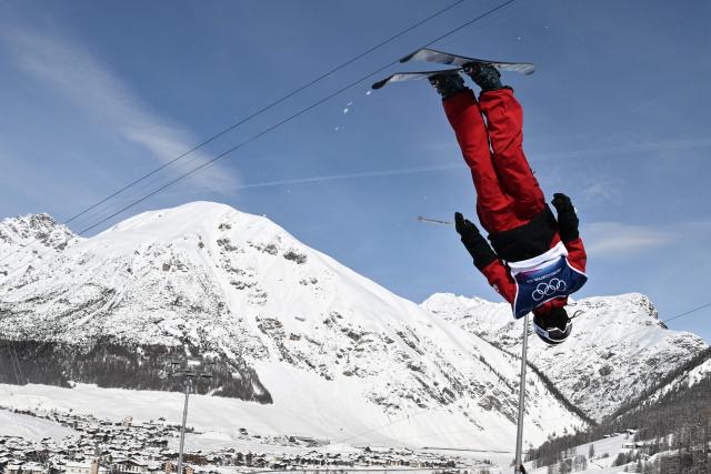 Canada's Rachael Karker competes in the freestyle skiing women's freeski halfpipe final run 3 during the Milano Cortina 2026 Winter Olympic Games at Livigno Snow Park, in Livigno (Valtellina), on February 22, 2026. (Photo by Jeff PACHOUD / AFP)