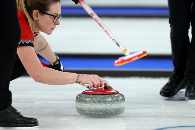 Switzerland's Alina Paetz delivers the stone in the curling women's round robin gold medal game between Switzerland and Sweden during the Milano Cortina 2026 Winter Olympic Games at the Cortina Curling Olympic Stadium in Cortina d’Ampezzo on February 22, 2026. (Photo by Odd ANDERSEN / AFP)