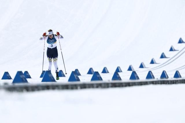Sweden's Ebba Andersson competes during the women's cross country 50km mass start final event of the Milano Cortina 2026 Winter Olympic Games at Tesero Cross-Country Skiing Stadium in Lago di Tesero (Val di Fiemme), on February 22, 2026. (Photo by Anne-Christine POUJOULAT / AFP)