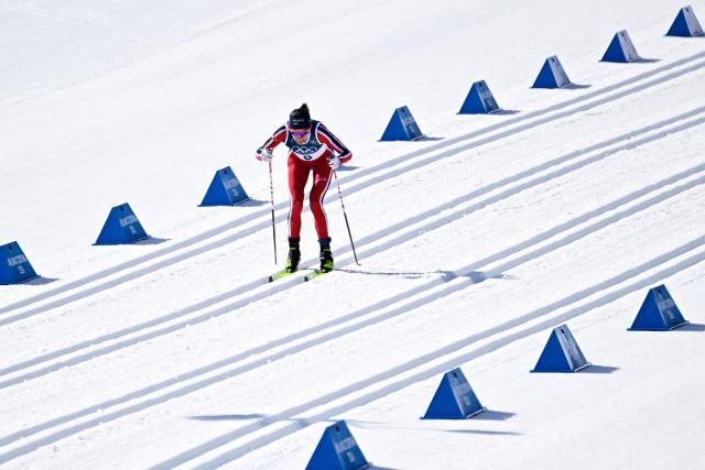 Norway's Heidi Weng competes during the women's cross country 50km mass start final event of the Milano Cortina 2026 Winter Olympic Games at Tesero Cross-Country Skiing Stadium in Lago di Tesero (Val di Fiemme), on February 22, 2026. (Photo by Tobias SCHWARZ / AFP)