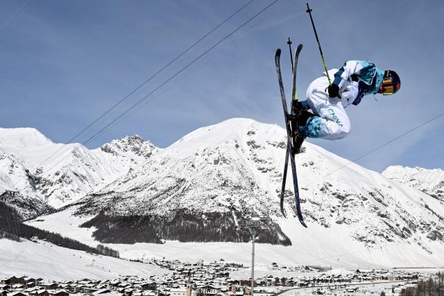 China's Li Fanghui competes in the freestyle skiing women's freeski halfpipe final run 3 during the Milano Cortina 2026 Winter Olympic Games at Livigno Snow Park, in Livigno (Valtellina), on February 22, 2026. (Photo by Jeff PACHOUD / AFP)