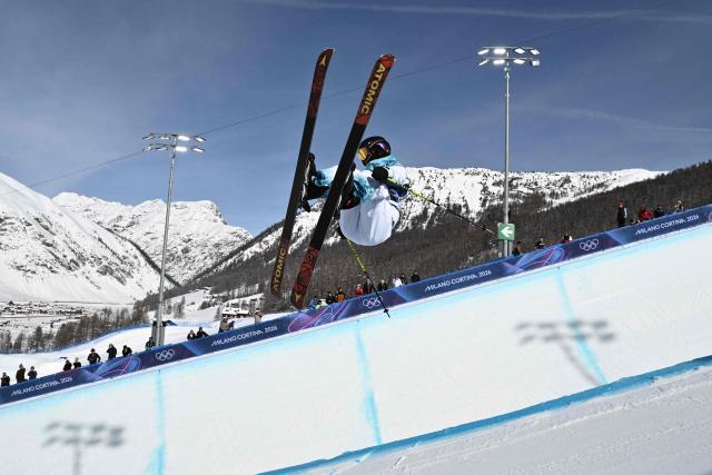 China's Li Fanghui competes in the freestyle skiing women's freeski halfpipe final run 3 during the Milano Cortina 2026 Winter Olympic Games at Livigno Snow Park, in Livigno (Valtellina), on February 22, 2026. (Photo by Jeff PACHOUD / AFP)