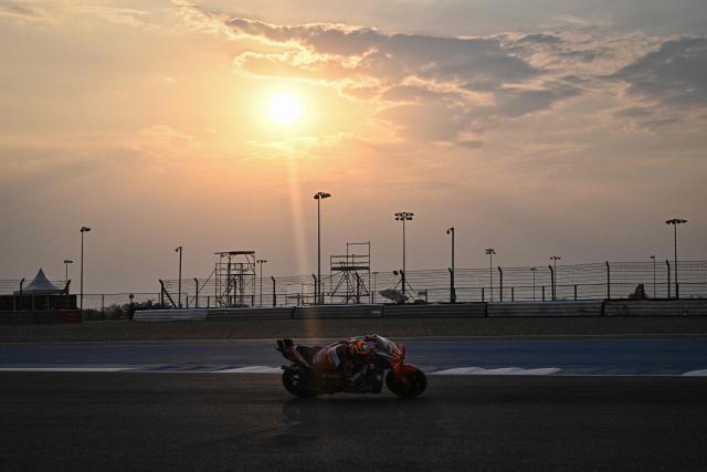 Honda HRC Castrol Italian rider Luca Marini rides on the track during the second day of the 2026 MotoGP pre-season test at the Buriram International Circuit in Buriram on February 22, 2026. (Photo by Lillian SUWANRUMPHA / AFP)
