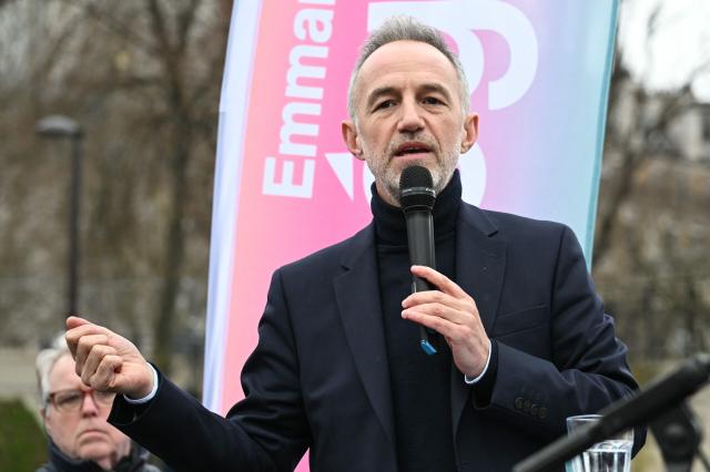 Socialist candidate for Mayor in Paris Emmanuel Gregoire speaks during a public debate as part of the campaign for France's upcoming municipal elections in Paris on February 22, 2026. (Photo by Bertrand GUAY / AFP)