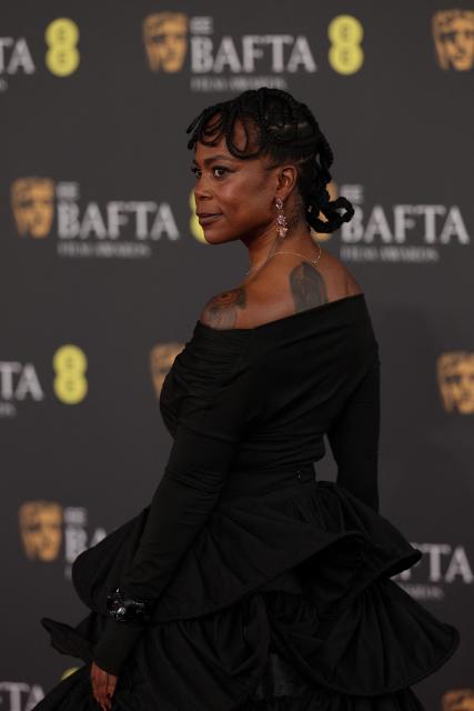 US production designer Hannah Beachler poses on the red carpet upon arrival at the BAFTA British Academy Film Awards at the Royal Festival Hall, Southbank Centre, in London, on February 22, 2026. (Photo by Adrian Dennis / AFP)