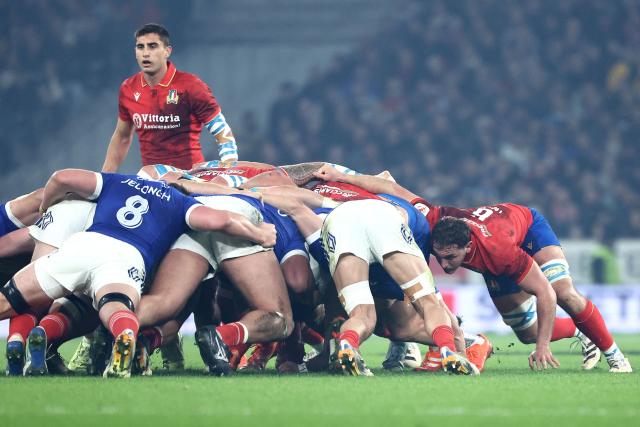 Italy's scrum-half Alessandro Fusco (L) looks over the scrum during the Six Nations international rugby union match between France and Italy at the Stade Pierre-Mauroy in Villeneuve-d'Ascq, northern France, on February 22, 2026. (Photo by Sameer AL-DOUMY / AFP)