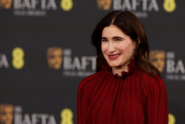 US actor Kathryn Hahn poses on the red carpet upon arrival at the BAFTA British Academy Film Awards at the Royal Festival Hall, Southbank Centre, in London, on February 22, 2026. (Photo by Adrian Dennis / AFP)