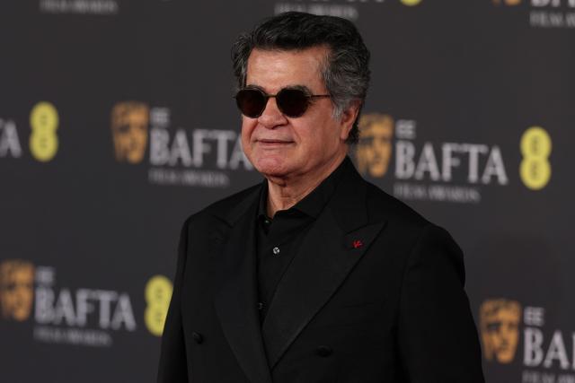 Iranian director Jafar Panahi poses on the red carpet upon arrival at the BAFTA British Academy Film Awards at the Royal Festival Hall, Southbank Centre, in London, on February 22, 2026. (Photo by Adrian Dennis / AFP)