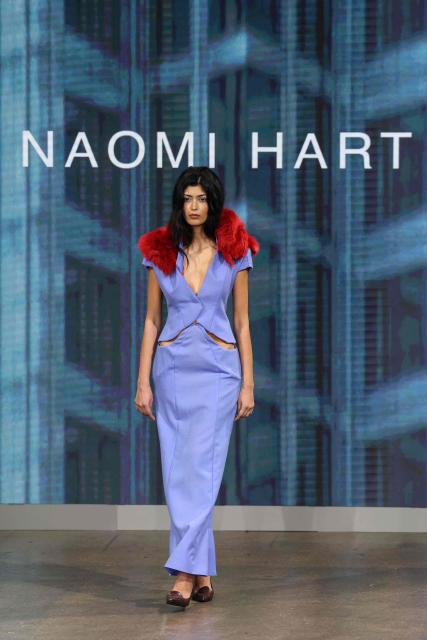 A model presents a creation from the Autumn-Winter 2026-2027 collection 'The Sovereignty Of Stillness' from Britain-based womenswear designer Naomi Hart at London Fashion Week at Fashion Scout, in London on February 22, 2026. (Photo by Toby Shepheard / AFP)