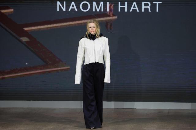 A model presents a creation from the Autumn-Winter 2026-2027 collection 'The Sovereignty Of Stillness' from Britain-based womenswear designer Naomi Hart at London Fashion Week at Fashion Scout, in London on February 22, 2026. (Photo by Toby Shepheard / AFP)