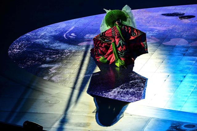Japanese-Italian actress Jun Ichikawa performs as Madama Butterfly during the closing ceremony of the Milano Cortina 2026 Winter Olympic Games at the Verona Arena in Verona, northern Italy, on February 22, 2026. (Photo by Piero CRUCIATTI / AFP)