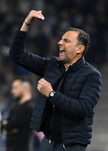 Rio Ave's Greek coach Sotiris Sylaidopoulos reacts during the Portuguese League football match between FC Porto and Rio Ave FC at Dragao stadium in Porto on February 22, 2026. (Photo by Miguel RIOPA / AFP)