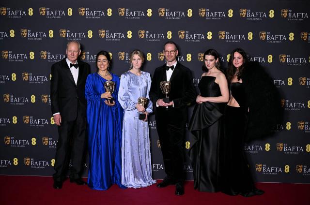 Swedish actor Stellan skarsgard, Danish-Norwegian film director Joachim Trier, Norwegian film producer Maria Ekerhovd and Norwegian film producer Andrea Berentsen Ottmar pose with the award for Best film not in English language for "Sentimental Value" during the BAFTA British Academy Film Awards ceremony at the Royal Festival Hall, Southbank Centre, in London, on February 22, 2026. (Photo by JUSTIN TALLIS / AFP)