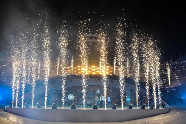 Music collective Major Lazer perform during the closing ceremony of the Milano Cortina 2026 Winter Olympic Games at the Verona Arena in Verona, northern Italy, on February 22, 2026. (Photo by Stefano RELLANDINI / AFP)