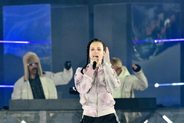 Danish singer Mo performs with music collective Major Lazer during the closing ceremony of the Milano Cortina 2026 Winter Olympic Games at the Verona Arena in Verona, northern Italy, on February 22, 2026. (Photo by Stefano RELLANDINI / AFP)