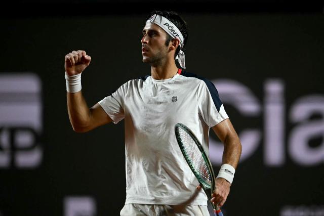 Argentina's Tomas Etcheverry celebrates a point against Chile's Alejandro Tabilo during their men's singles final match at the Rio Open tennis tournament in Rio de Janeiro, Brazil, on February 22, 2026. (Photo by Mauro PIMENTEL / AFP)