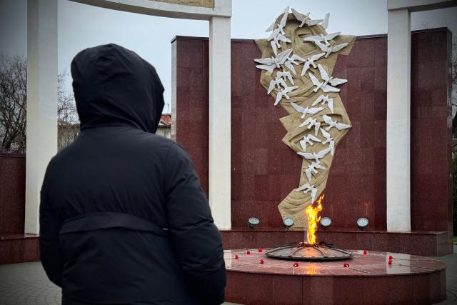The 48-year-old Ukrainian living in Russia for 20 years, Maria (whose name has been changed to protect her identity) visits a World War Two (WWII) memorial in the Moscow region on December 17, 2025. (Photo by AFP)