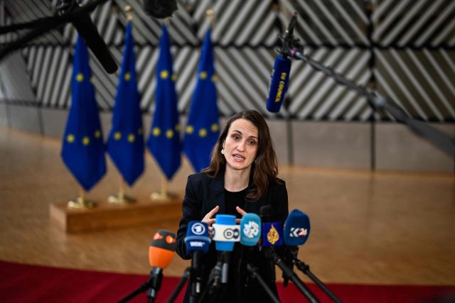 Romania's Foreign Minister Oana Toiu speaks to the press as she arrives for the EU Foreign Affairs Council in Brussels on February 23, 2026. (Photo by JOHN THYS / AFP)