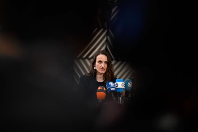 Romania's Foreign Minister Oana Toiu speaks to the press as she arrives for the EU Foreign Affairs Council in Brussels on February 23, 2026. (Photo by JOHN THYS / AFP)