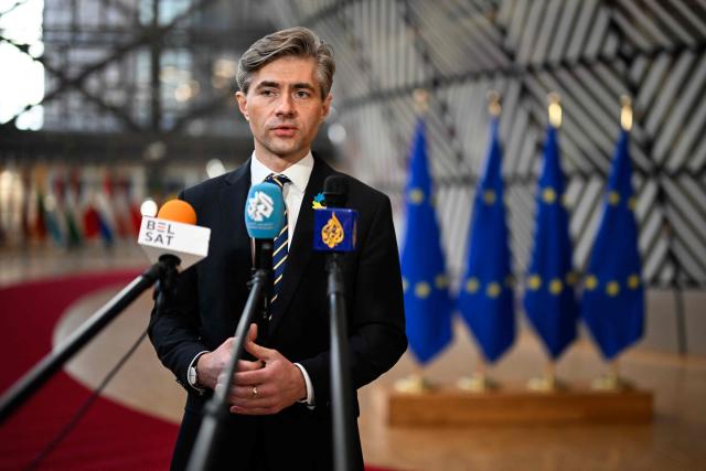 Lithuania's Foreign Affairs Minister Kestutis Budrys speaks to the press as he arrives for the EU Foreign Affairs Council in Brussels on February 23, 2026. (Photo by JOHN THYS / AFP)