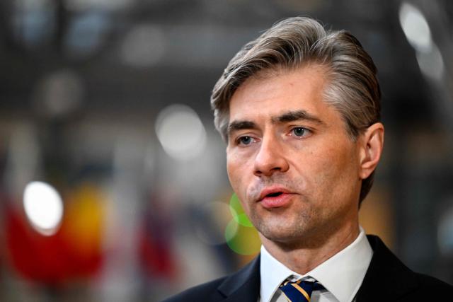 Lithuania's Foreign Affairs Minister Kestutis Budrys speaks to the press as he arrives for the EU Foreign Affairs Council in Brussels on February 23, 2026. (Photo by JOHN THYS / AFP)