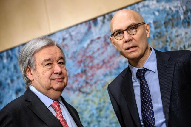 UN Secretary-General Antonio Guterres (L) and UN High-Commissioner for Human Rights Volker Turk look on at the opening of the 61st session of the UN Human Rights Council at the United Nations office in Geneva on February 23, 2026. Human rights are under "full-scale attack around the world", United Nations chief Antonio Guterres warned on February 23, 2026, with the most powerful often leading the charge. (Photo by Fabrice COFFRINI / AFP)