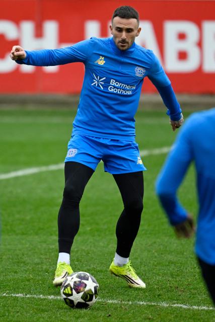 Bayer Leverkusen's Spanish midfielder #24 Aleix Garcia attends a training session on February 23, 2026 in Leverkusen, western Germany, on the eve of the UEFA Champions League - Knockout round play-off - Second Leg football match of Bayer Leverkusen (GER) v Olympiakos (GRE). (Photo by INA FASSBENDER / AFP)