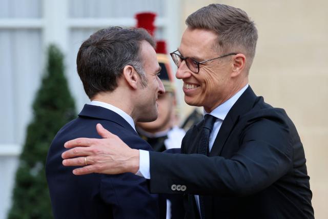 France's President Emmanuel Macron welcomes Finland's President Alexander Stubb before a meeting at The Elysee Presidential Palace in Paris on February 23, 2026. (Photo by Ludovic MARIN / AFP)