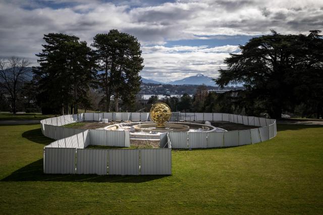 This photograph shows protections around the Celestial Sphere, known also as the Woodrow Wilson Memorial Sphere, as it is under renovation at the "Palais des Nations" building which houses the United Nations Offices in Geneva on February 23, 2026. The United Nations Office at Geneva has embarked on a full renovation of its historic headquarters combined with the construction of new buildings. (Photo by Fabrice COFFRINI / AFP)