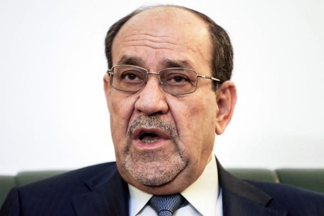 Iraq’s former prime minister and candidate for the premiership, Nouri al-Maliki, speaks during an interview with AFP at his office in the Green Zone in Baghdad on February 23, 2026. (Photo by Ahmad AL-RUBAYE / AFP)