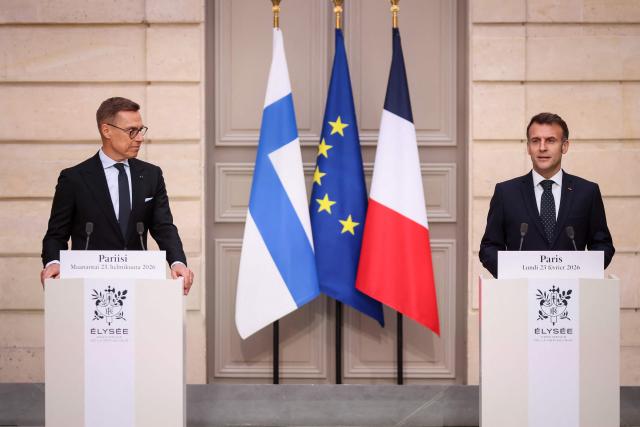 France's President Emmanuel Macron and Finland's President Alexander Stubb (L) hold a joint statement at The Elysee Presidential Palace in Paris on February 23, 2026. (Photo by Thomas Padilla / POOL / AFP)