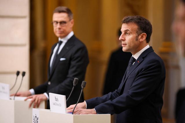 France's President Emmanuel Macron and Finland's President Alexander Stubb (L) hold a joint statement at The Elysee Presidential Palace in Paris on February 23, 2026. (Photo by Thomas Padilla / POOL / AFP)