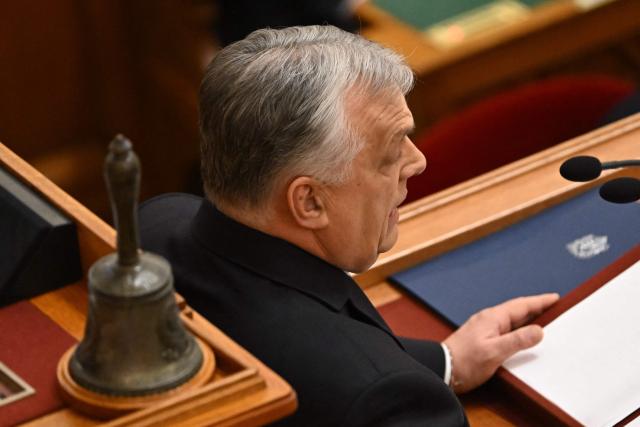 Hungarian Prime Minister Viktor Orban addresses a speech before the agenda in the main hall of the parliament building during the spring session of the Hungarian Parliament in Budapest, Hungary, on February 23, 2026. The nationalist leader is facing the toughest challenge since returning to power in 2010, with his Fidesz party trailing the opposition TISZA party in opinion polls ahead of parliamentary elections on April 12, 2026. (Photo by Attila KISBENEDEK / AFP)