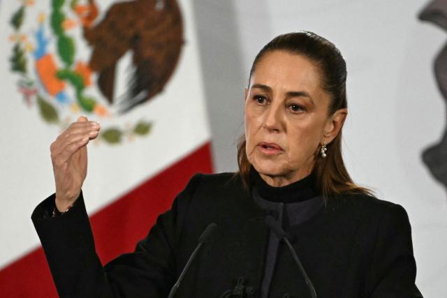 Mexico's President Claudia Sheinbaum speaks during her daily press conference at Palacio Nacional in Mexico City on February 23, 2026. Mexico was on high alert on February 23 with schools closed and travelers stranded, as members of a powerful drug cartel went on a violent rampage across parts of the country after the army announced it had killed its leader. (Photo by YURI CORTEZ / AFP)