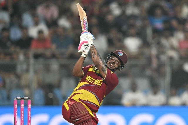 West Indies' Shimron Hetmyer plays a shot during the 2026 ICC Men's T20 Cricket World Cup Super Eights match between West Indies and Zimbabwe at the Wankhede Stadium in Mumbai on February 23, 2026. (Photo by Punit PARANJPE / AFP)