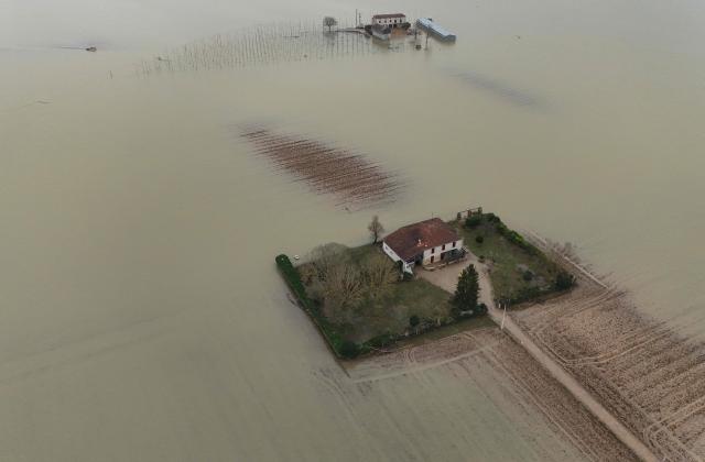 This aerial photograph shows a flooded area along the overflowing Garonne River in Bourdelles, south-western France, on February 23, 2026. (Photo by Christophe ARCHAMBAULT / AFP)