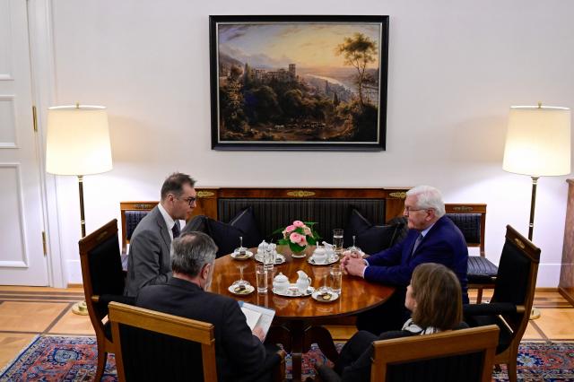 German President Frank-Walter Steinmeier (R) sits with Ukraine's ambassador to Germany Oleksii Makeiev (L) as they meet marking the 4th anniversary of Russia's full-scale invasion of Ukraine at the presidential Bellevue Palace in Berlin, on February 23, 2026. (Photo by John MACDOUGALL / AFP)