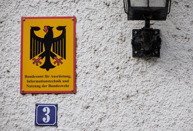 A picture shows a sign on the headquarters' building of the Federal Office of Bundeswehr Equipment, Information Technology and In-Service Support (Bundesamt für Ausruestung, Informationstechnik und Nutzung der Bundeswehr - BAAINBw) of the German Army Bundeswehr on February 23, 2026 in Koblenz, Rhineland-Palatinate, western Germany. (Photo by HANNES P ALBERT / AFP)
