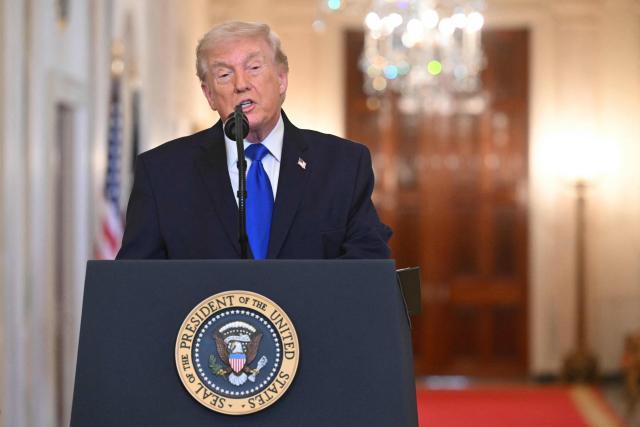 US President Donald Trump speaks during the Angel Families Remembrance Ceremony in the East Room of the White House in Washington, DC, on February 23, 2026. (Photo by SAUL LOEB / AFP)