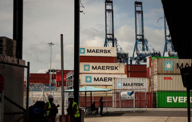 This view shows the Port of Balboa, managed by CK Hutchison Holdings based in Hong Kong, at the entrance to the Panama Canal in Panama City on February 23, 2026. Panamanian maritime authorities on February 23, 2026, took control of two ports on the Panama Canal from Hong Kong-based CK Hutchison after its concession was annulled following pressure from the United States. (Photo by MARTIN BERNETTI / AFP)