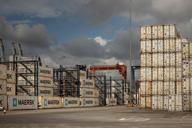 This view shows the Port of Balboa, managed by CK Hutchison Holdings based in Hong Kong, at the entrance to the Panama Canal in Panama City on February 23, 2026. Panamanian maritime authorities on February 23, 2026, took control of two ports on the Panama Canal from Hong Kong-based CK Hutchison after its concession was annulled following pressure from the United States. (Photo by MARTIN BERNETTI / AFP)